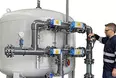 Man working in front of a Filtraflo unit